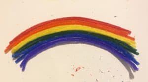 Glue the pipe cleaners together to make a rainbow shape
