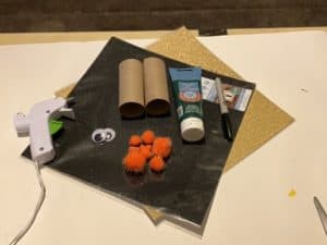 Supplies needed to make an easy St. Patrick’s Day Pine cone leprechaun kids craft