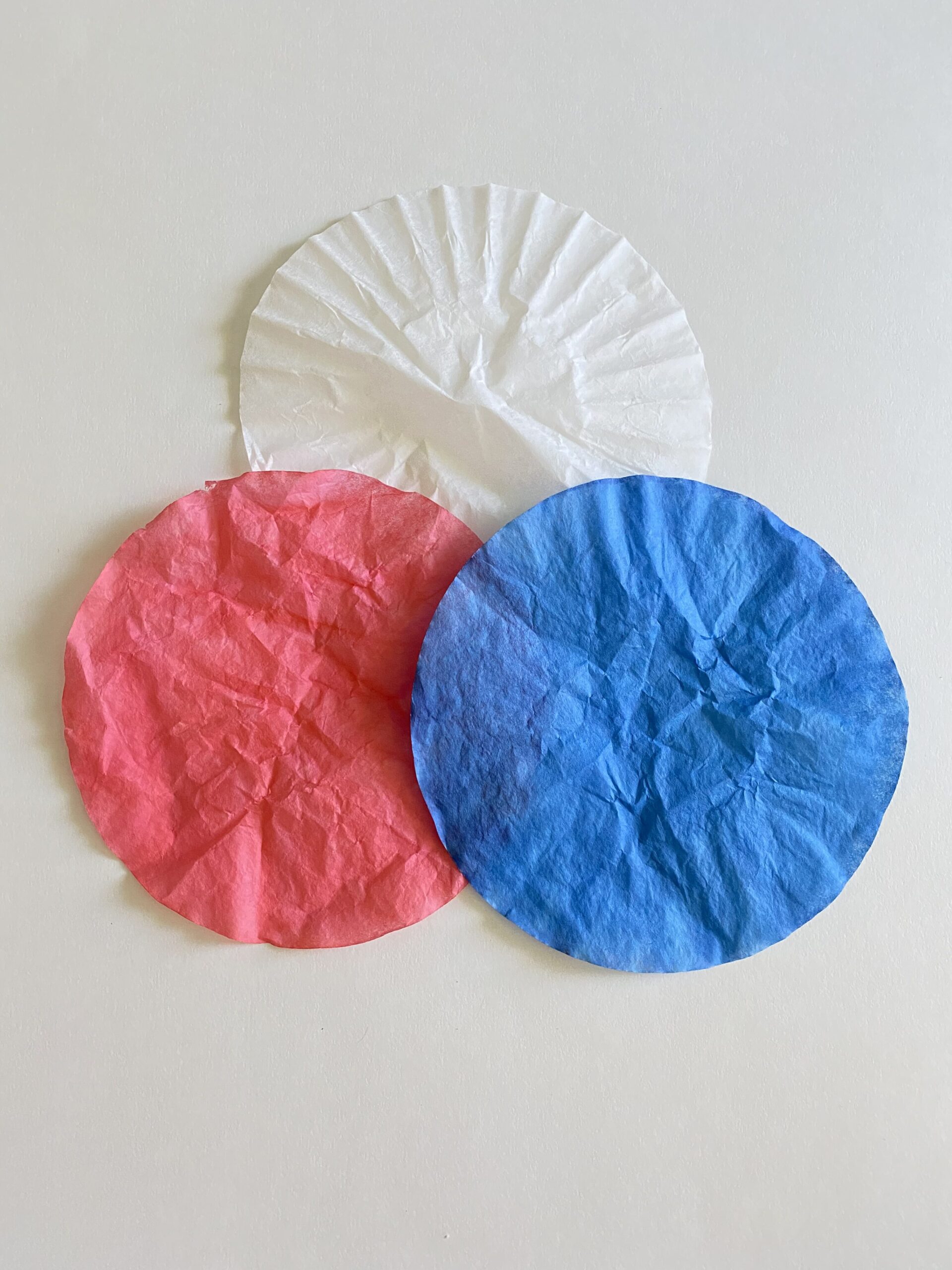 Red white and blue dyed coffee filters with food coloring 