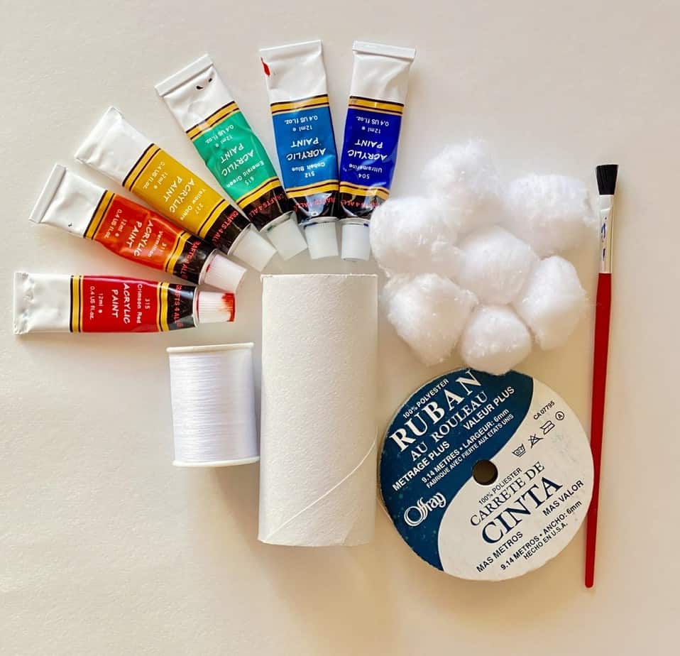 Supplies needed to make a toilet paper roll rainbow windsock craft