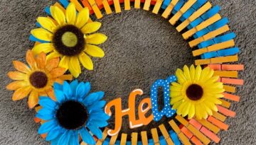 Yellow, blue, and orange "hello" summer sunflower DIY clothespin wreath finished