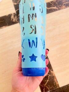 Paint white stars on the blue painted mason jar using stencil or freehand to make the american flag stars