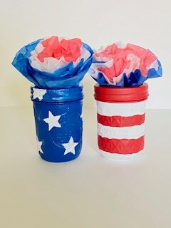 Patriotic mason jars with red white and blue dyed coffee filters