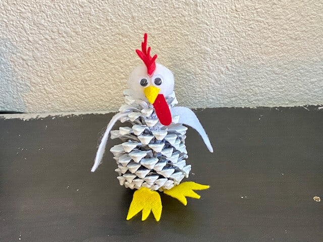 Pine cone rooster chicken. Kids nature farm animal craft