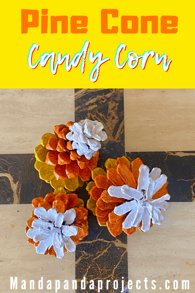 Painted pine cone candy corn. Fall and halloween nature craft decor.