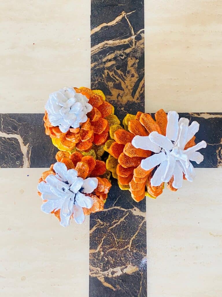 Painted pine cone candy corn fall craft