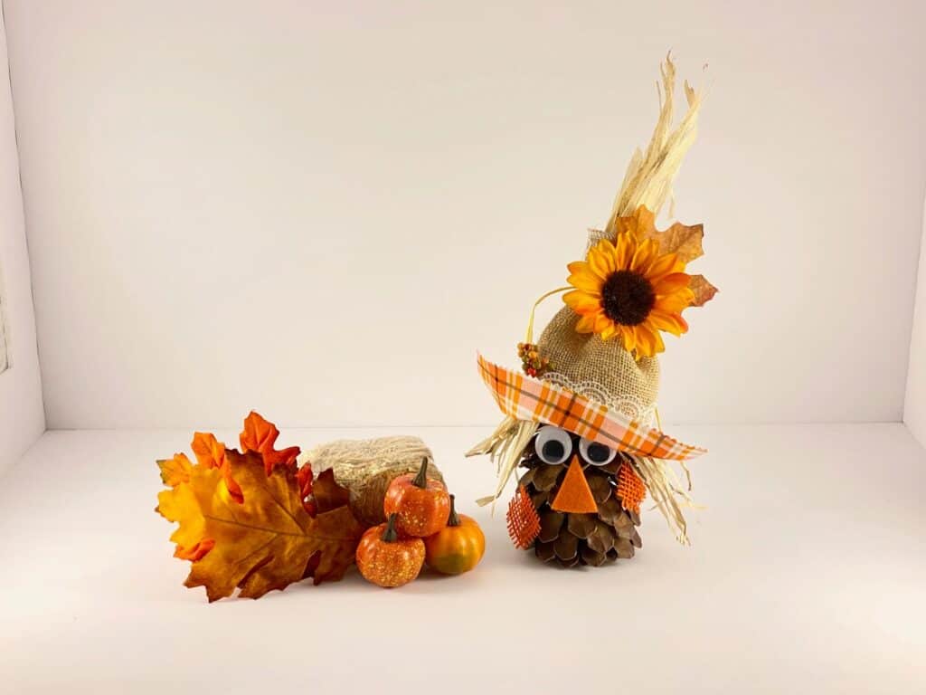 Pine Cone scarecrow. Fun and easy Fall nature craft and DIY fall decor.