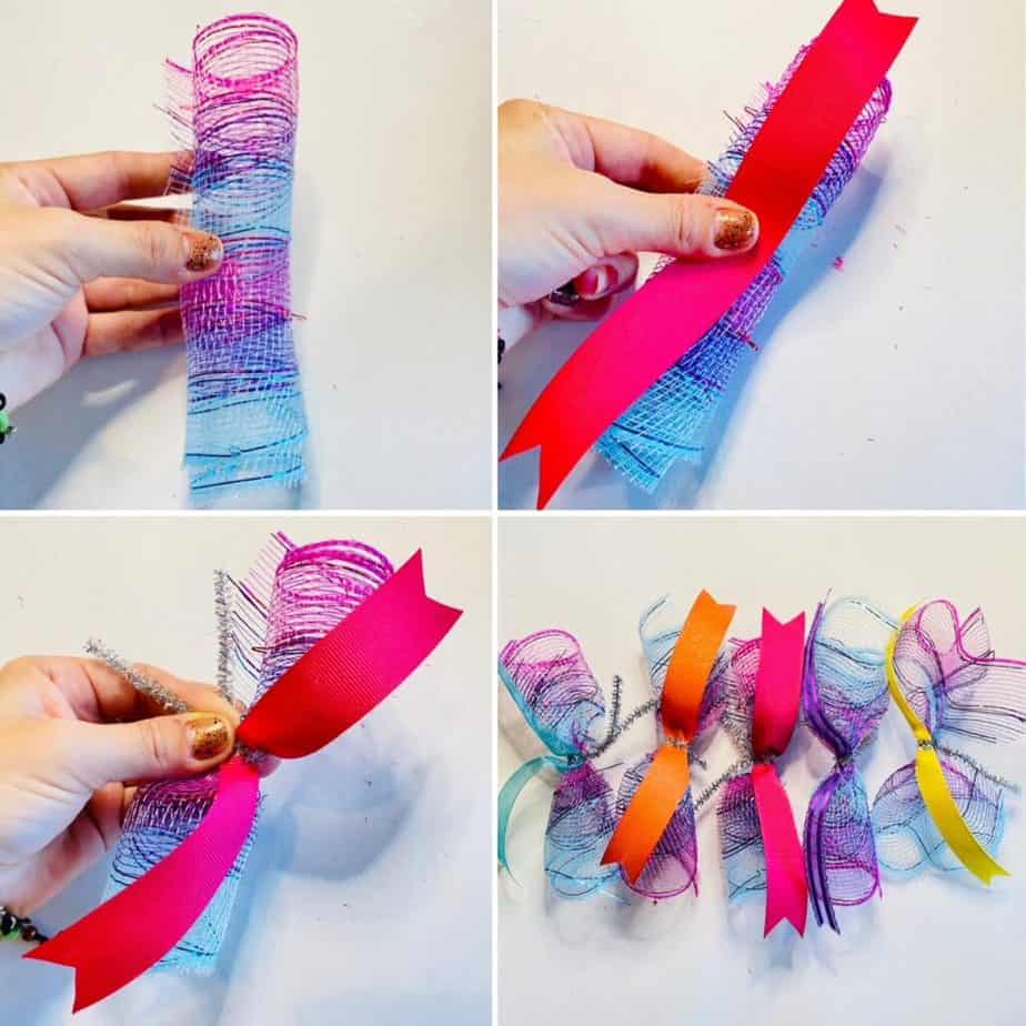Roll the deco mesh strips up loosely, place a ribbon strip on top, wrap a pipe cleaner piece around it, and twist slightly to secure.