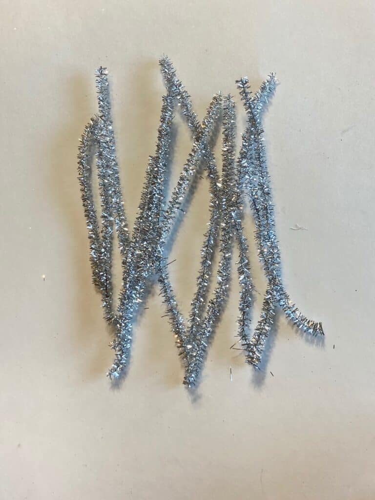 Cut 10-15 silver pipe cleaners into 3rds.