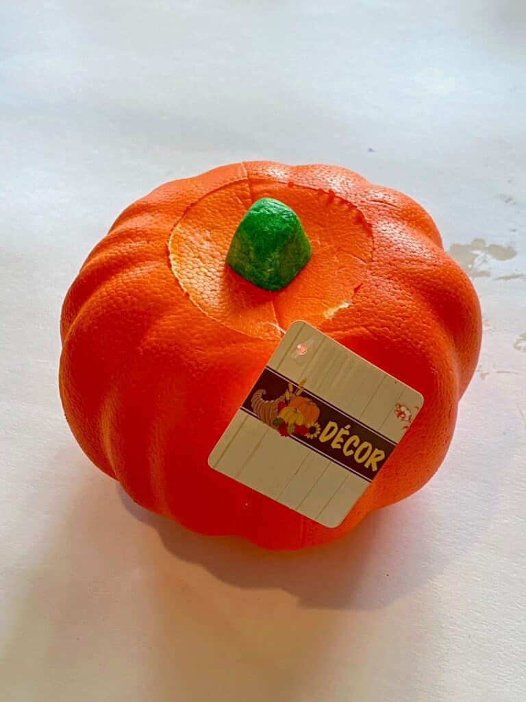 DIY Dollar tree orange carveable foam pumpkin.