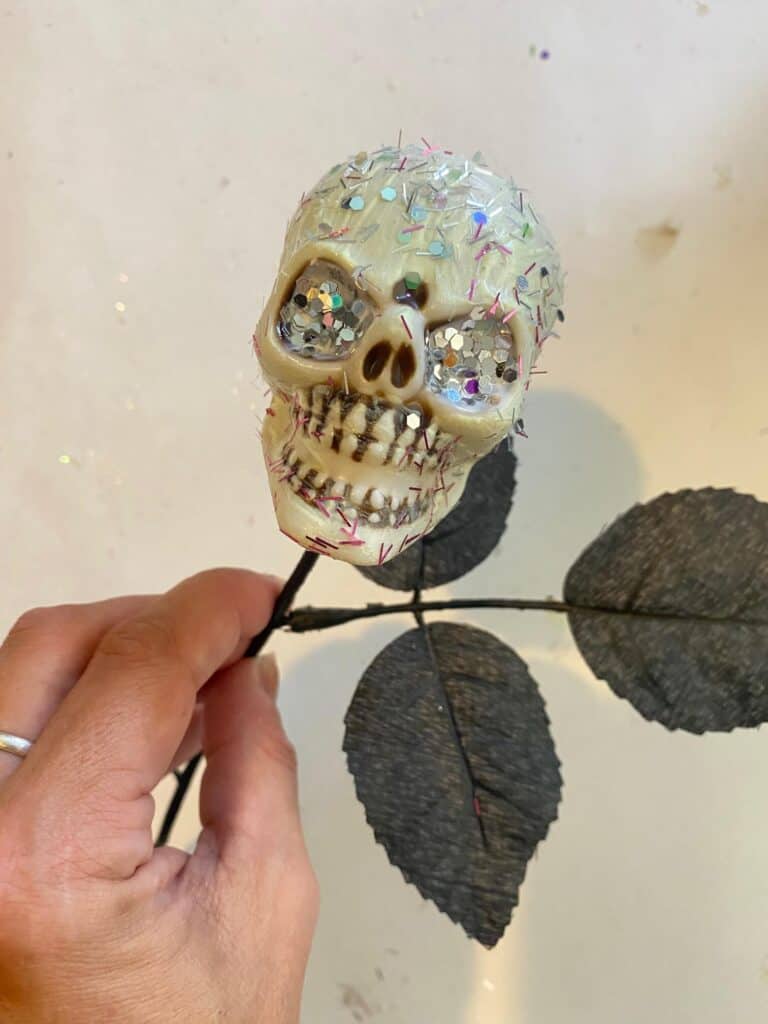 Add the Glitter Skull Pick to your Dollar Tree Deco Mesh Witch Hat!