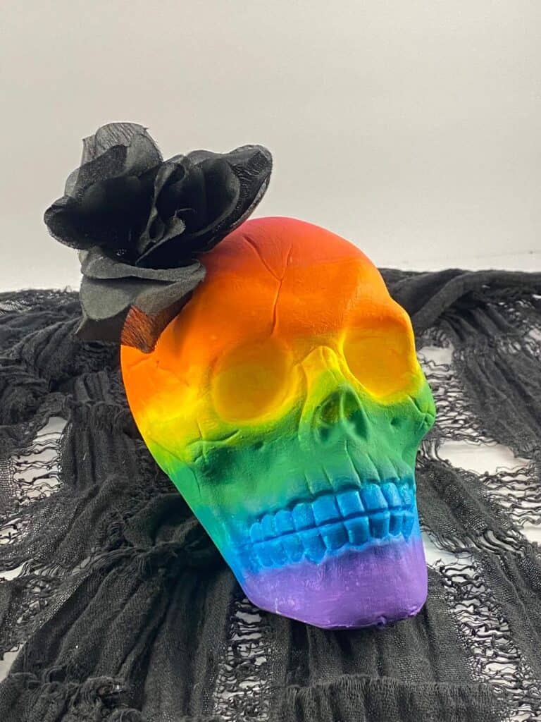 Dollar Tree Skull Makeover DIY. Rainbow Painted Ombre Skull with faux black rose for Halloween.