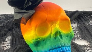 Dollar Tree DIY Rainbow Ombre Painted Skull for Halloween.