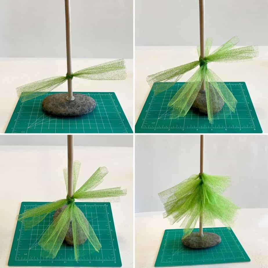4 pictures in one showing the beginning stages of making the Glitter Tulle Christmas trees. A piece of green tulle tied around the bottom of a wooden dowel, followed by several other pieces tied in a circular fashion to form a christmas tree shape.