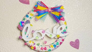Fun and colorful Dollar Tree Conversation Heart Napkin Foam Wreath for a Valentines Day craft decor for your home.