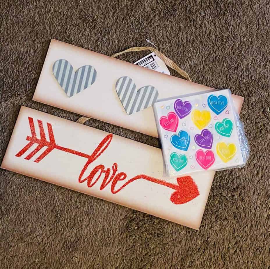 Dollar Tree "Love" sign with galvanized metal hearts and conversation heart napkins.