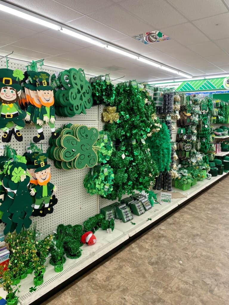 Entire Aisle at the Dollar Tree full of St. Patrick's Day craft supplies and decor.