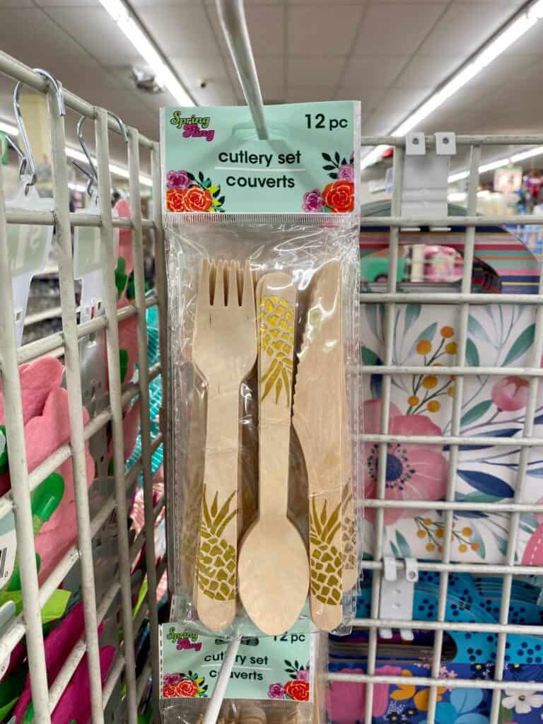 Wooden cutlery with gold pineapple trim.