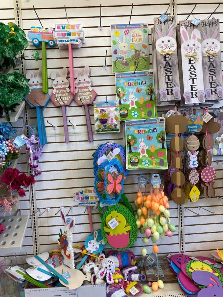 Easter and Spring lawn decor and window clings hanging up at Dollar Tree.