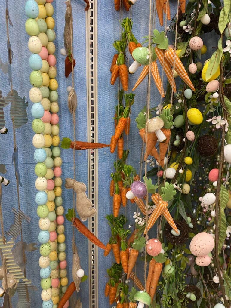 Decorative garland with Easter eggs, carrots, and bunnies.