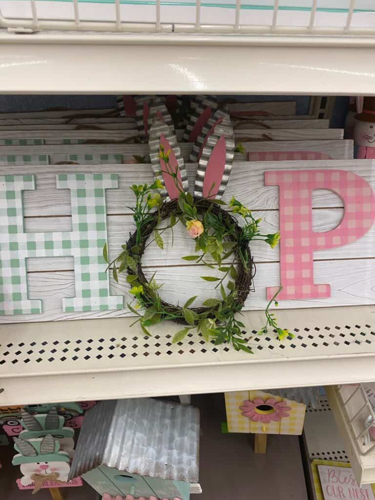 Wooden "Hop" sign with a grapevine wreath and bunny ears as the "O".