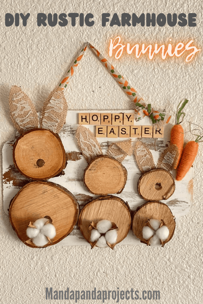 DIY rustic farmhouse wooden Easter bunny decor craft project with burlap ears, twine carrots, and Hoppy Easter message in scrabble tiles, hanging with a carrot ribbon.