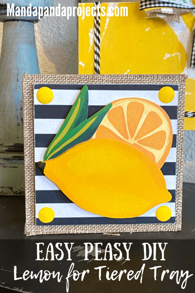 Easy peasy DIY Lemon for tiered tray. Lemon wooden cutout on a black and white striped background on a burlap wooden block.