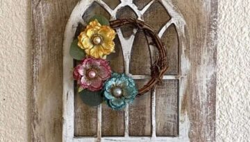 DIY Dollar Tree Cathedral window decor craft with a mini grapevine wreath and scrapbook embellishment flowers and a galvanized metal Welcome sign.