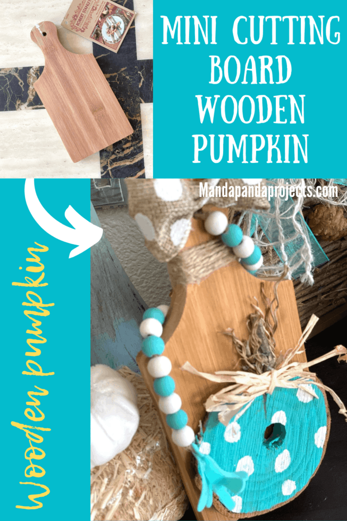 DIY Mini cutting board teal wooden pumpkin fall tiered tray decor with a wood bead garland next to a hay bale and a white pumpkin.