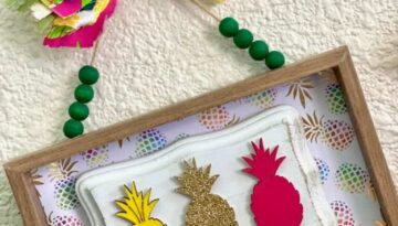 DIY Dollar Tree Pink, yellow, and gold pineapple sticker frame wall hanging for summer crafts or decor for a little girls room.