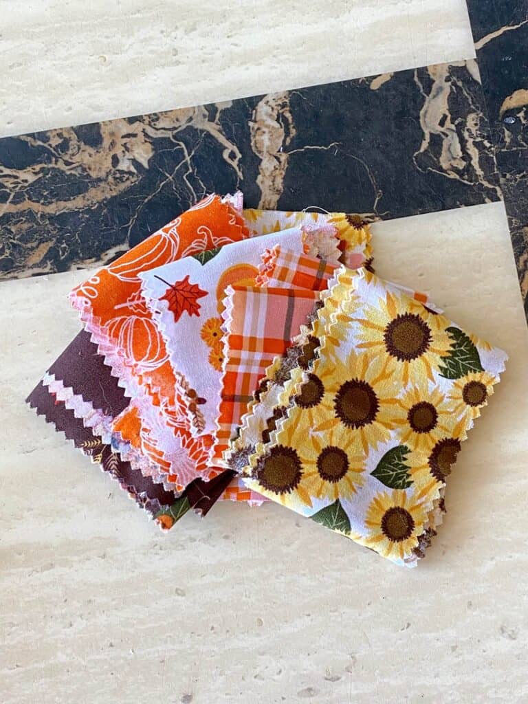 5 different patterns of fall and sunflower them fabric pieces.