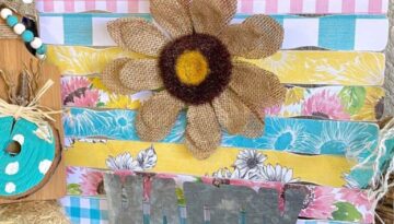 "happy" burlap Sunflower made with Hobby Lobby pink, teal, and yellow Sunflower scrapbook paper for beautiful crafty decor that works for Spring, Summer, or even Fall.