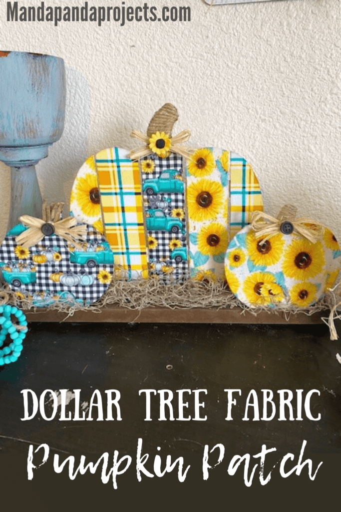 Dollar Tree wooden fabric pumpkin patch DIY with Sunflower truck and teal plaid fabric with spanish moss and twine stems for DIY fall decor.