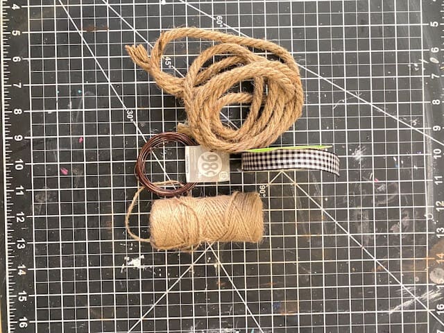Suppplies needed to make an easy diy twine pumpkin with floral wire and Jute rope.