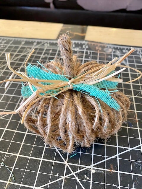 Add a small piece of raffia and ribbon for a bow.
