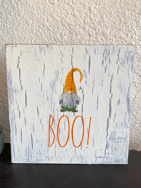 Front of the gnome napkin decoupaged onto a wooden box with crackle paint finish and the word BOO.