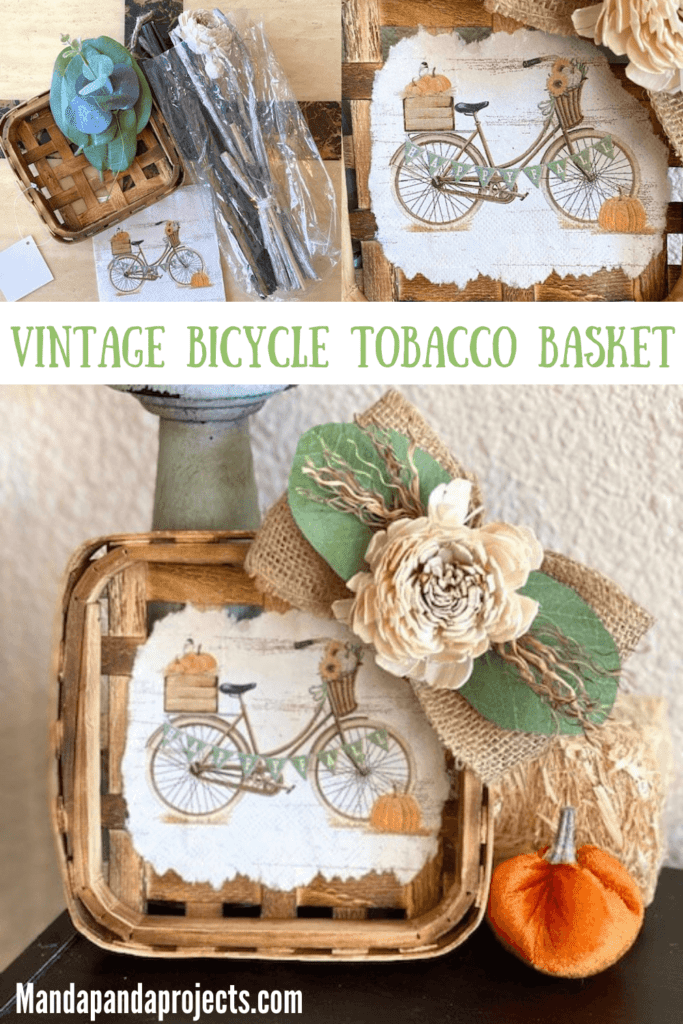Fall Vintage Bicycle Tobacco Basket made with a cocktail napkin mod podged to the center of a small burlap bow with wood flower and lambs ear, hanging on a white wall.