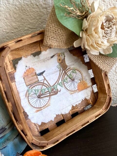 Mini Tobacco basket wreath with a vintage bicycle napkin that says "Happy Fall".