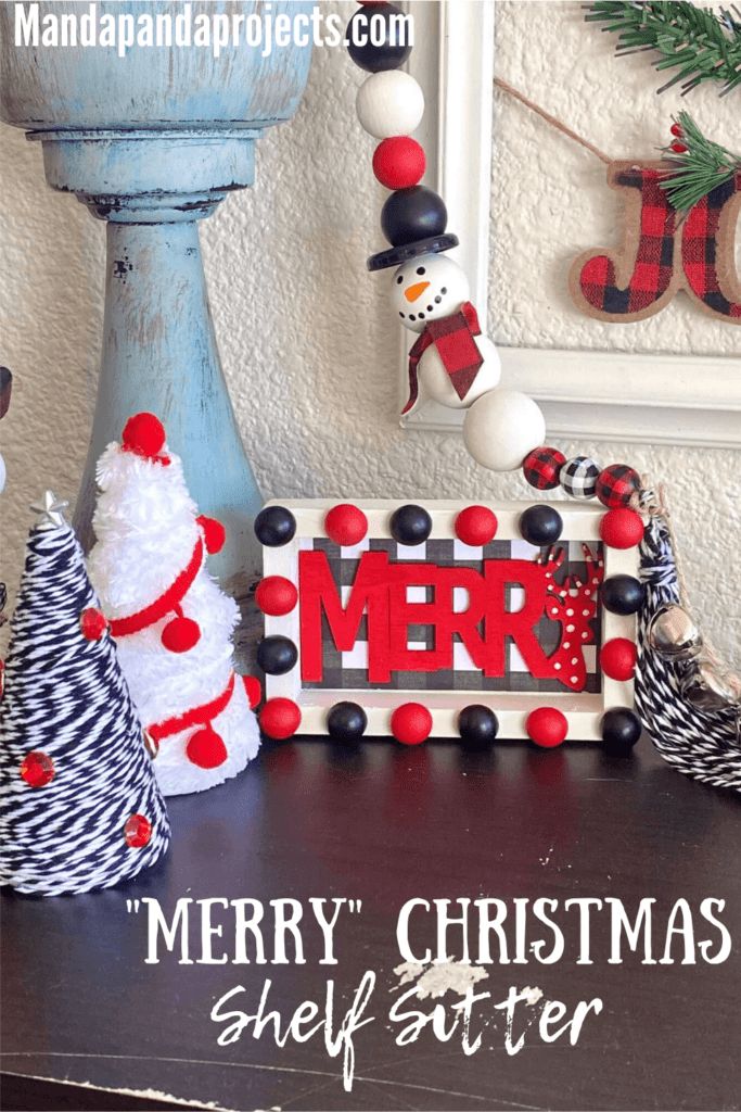 Merry Christmas DIY tiered tray decor sitter. Red, black, and white themed DIY Christmas decor with buffalo check and half wood bead decorative rim.