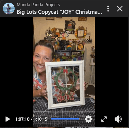 Amanda holding the completed project on a facebook live.