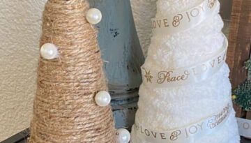 Rustic Twine and white chunky yarn wrapped foam cone Christmas trees made from Dollar Tree supplies with pearls and gold stars on top. DIY Christmas decor.