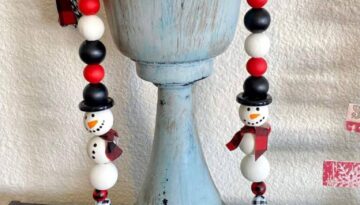 Red, white, and black themed snowman wood bead garland for a tiered tray with matching christmas tree ornament