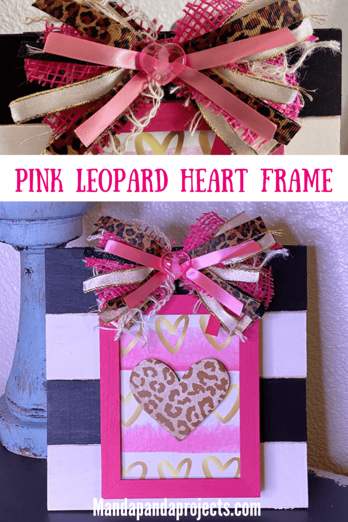 Pink and Leopard layered heart frame on a black and white striped background for easy Valentine's Day crafts and decor with a messy bow.