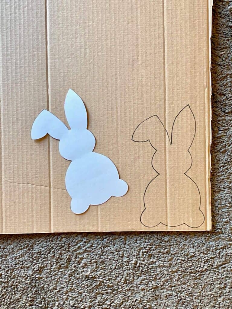 Easter bunny template traced onto a piece of cardboard.