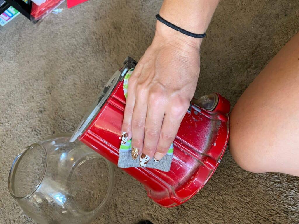 Clean the entire gumball machine with a rag and  soap and water.