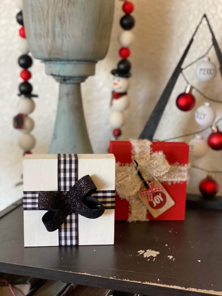 Easy DIY Wood Block Christmas Presents. DIY crafting decor to decorate a Christmas tiered tray this Holiday season in a red black and white color theme.