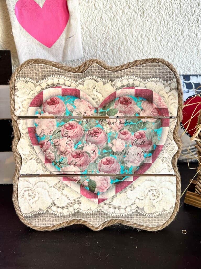 DIY Valentines Vintage Printable Heart Decor with roses, burlap, and lace on a wood Pallet Board to make DIY Valentine's Day Decor.