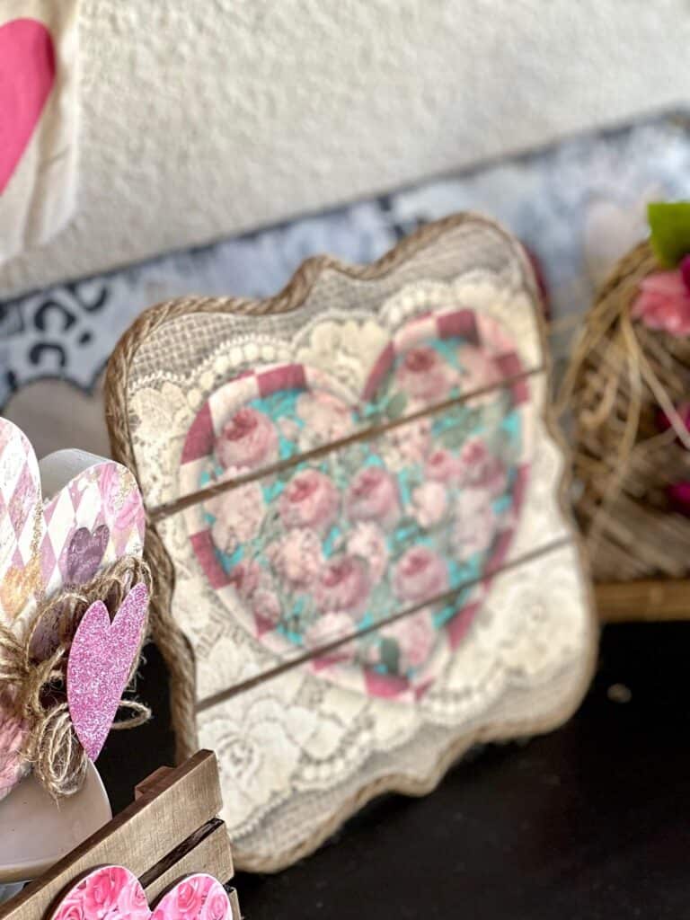 DIY Valentines Vintage Printable Heart Decor with roses, burlap, and lace on a wood Pallet Board to make DIY Valentine's Day Decor.