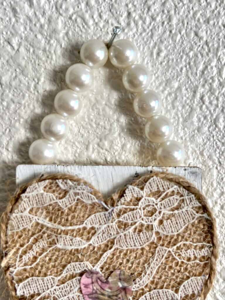 Pearl bead hanger for the vintage heart decor.