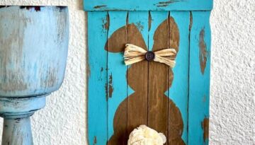 Reverse stencil wood bunny easter diy decor made with paint sticks and a sola wood flower tail and pip berry hanger.